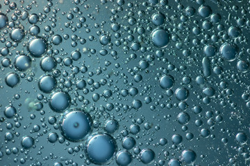 Abstract backgrounds. Oil babbles on water, abstraction . Macro