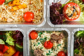 Healthy food take away, top view at wood background