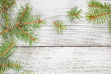 Christmas wooden background with fir tree. Top view copy space