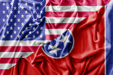 Ruffled waving United States of America and Tennessee flag