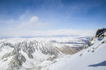The majestic mountain peaks of the Eastern Sayan mountains.