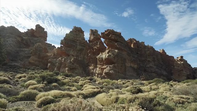 Hiking in Teide National Park. Footage of dramatic volcanic landscape of Teide volcano, Tenerife, Canary Islands, Spain.