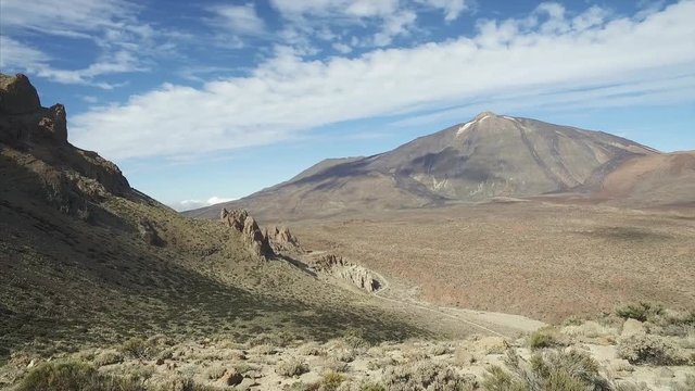 Panoramic view of dramatic volcanic landscape with majetic Teide volcano in a background, Tenerife, Canary Islands, Spain.