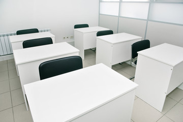 small training class, white room for 6 students