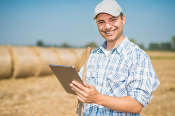 Farmer using his tablet