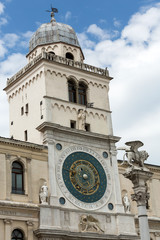 Fototapeta premium Clock tower building of medieval origins overlooking Piazza dei Signori in Padova, Italy