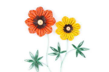 flowers made by quilling on a light background.