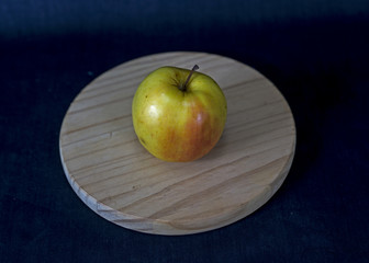 Fruit on a wooden round stand