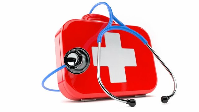 First aid kit with stethoscope isolated on white background