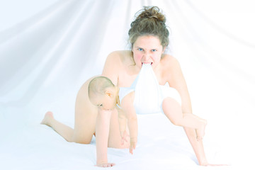 Mother carrying her baby - Mother's instinct conceptual idea