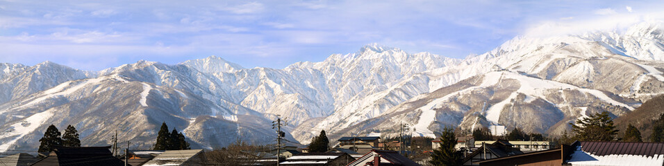 Hakuba mountain range in the afternoon early winter.  The steep terrain in the centre is between...
