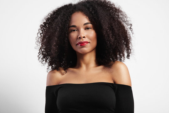 pretty black woman's portrait with curly hair
