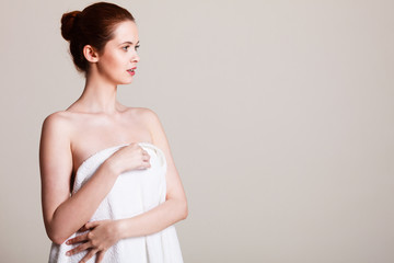 Obraz premium Naked woman in towel after bath