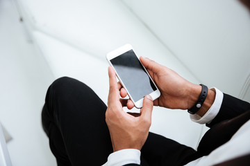 Top view of african business man with phone