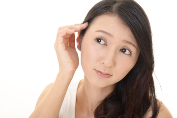 ヘアケアに不満な女性