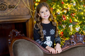 young beautiful girl with christmas gift