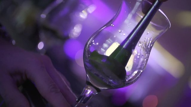 SLO MO CLOSE-UP Bartender preparing cocktail