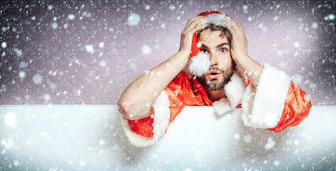 Handsome sad santa man