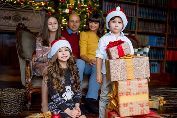Christmas family of five people, happy parents and their kids