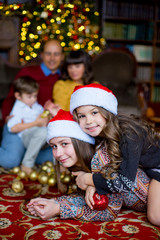 Obraz na płótnie Canvas Christmas family of five people, happy parents and their kids
