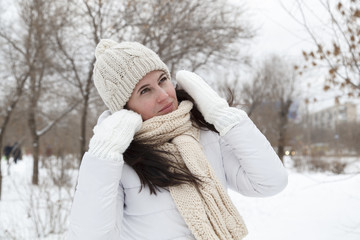 The girl in a winter white down-padded coat