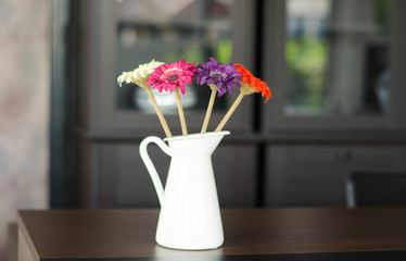 Flowers in a vase on the table
