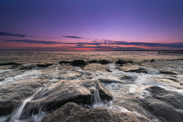 Rocky ocean sunset 