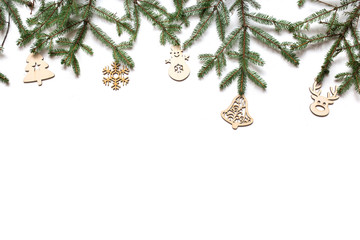 Christmas composition. Christmas gift, knitted blanket, pine cones, fir branches. Flat lay, top view