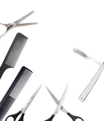 Comb with scissors and razor on a white background