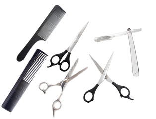 Comb with scissors and razor on a white background