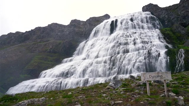 Scenic view of Dynjandi Waterfall, Westfjord, Iceland. Footage of a huge Dynjandi waterfall running in cascades from a mountain.