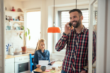 Talking on the phone - Powered by Adobe