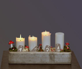 Jul - Tredje  ljuset tänt i Adventsstaken. 
