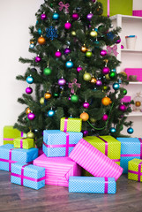 Christmas gifts are under the Christmas tree