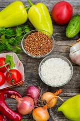 Vegetable set on a wooden background. Top view. Close-up