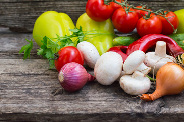 Vegetable set on a wooden background. Close-up