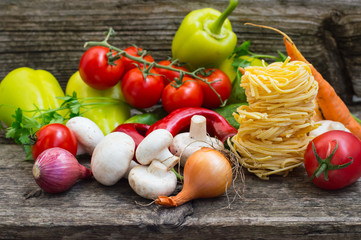 Vegetable set on a wooden background. Close-up