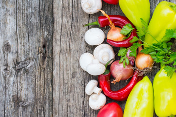 Vegetable set on a wooden background. Top view. Close-up