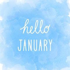 Hello January greeting on abstract blue watercolor background