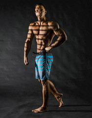 Fototapeta na wymiar Muscular European man Posing