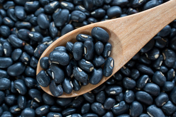 image black kidney beans in wooden spoon
