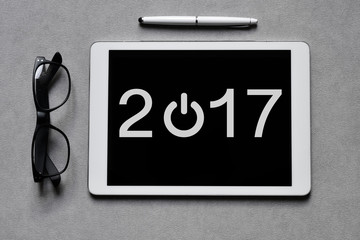 number 2017, as the new year, in a tablet