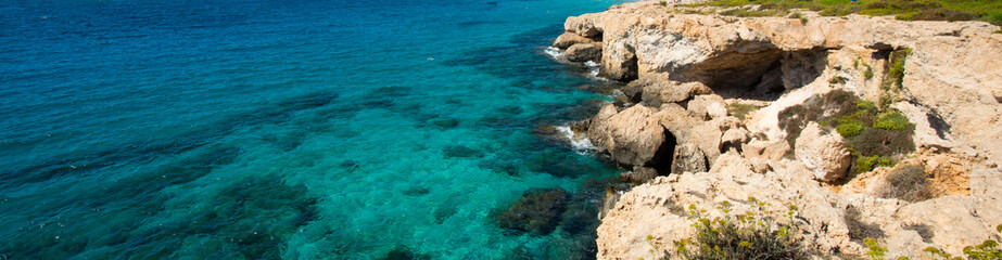 Stone cliff in a beautiful blue sea Cyprus