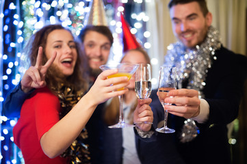Group of friends having party on New Years Eve.
