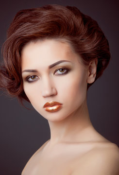 Beautiful woman portrait with fashion haircut and creative trendy make-up