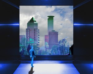 Surreal blue interior with large window on skyline and figure of the young man.