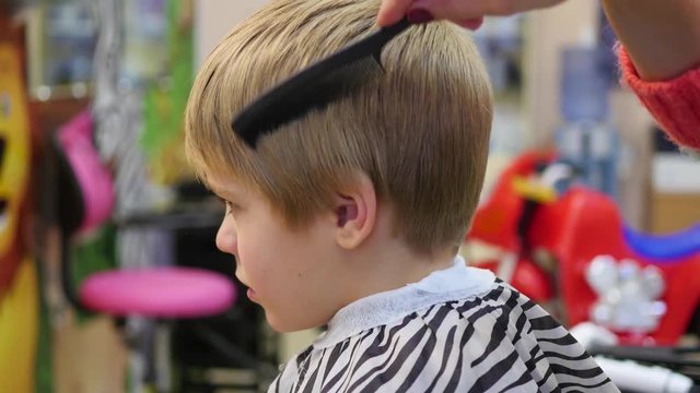child's haircut at the Barber shop