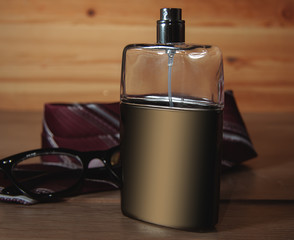 Male perfume with tie and glasses