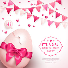 Girl baby shower with pink bow and cracked egg
