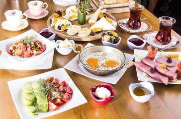 Turkish Breakfast - Fried Egg, Bread, Salad and Tea